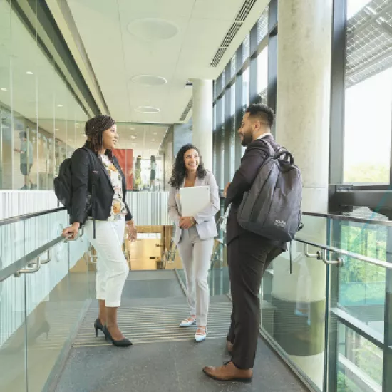 MMPA students standing inside IB building