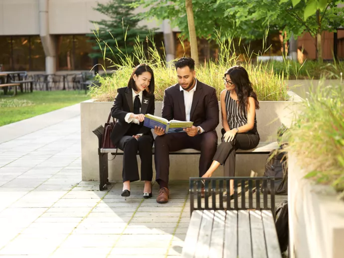 MMPA students sitting on campus